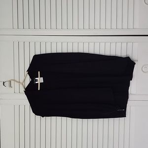 Tribal brand black vest with side zipper detail.